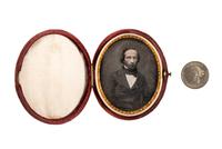 [EARLY PHOTOGRAPHY]. A group of daguerreotype portraits, incl. pendant, possible Hawaiian subject, and case featuring portrait of Daguerre.