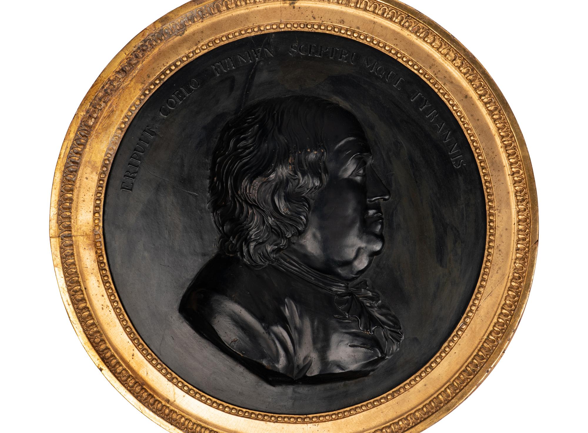 A Pair of Continental Cast Plaster Portrait Plaques of Benjamin Franklin and Thomas Jefferson