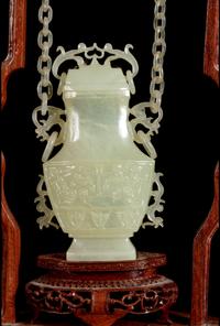 Two Chinese Serpentine Covered Hanging Vases