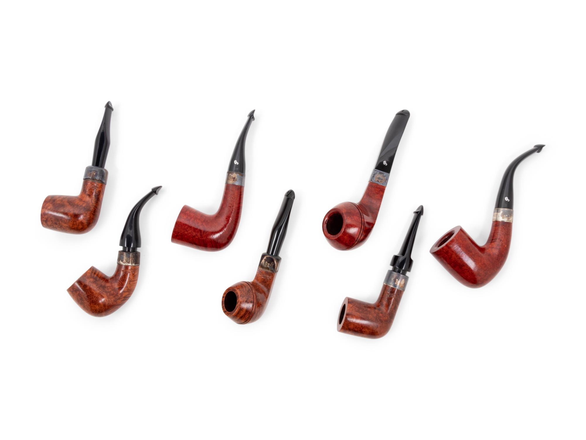A Group of Seven Peterson Commemorative Smoking Pipes
