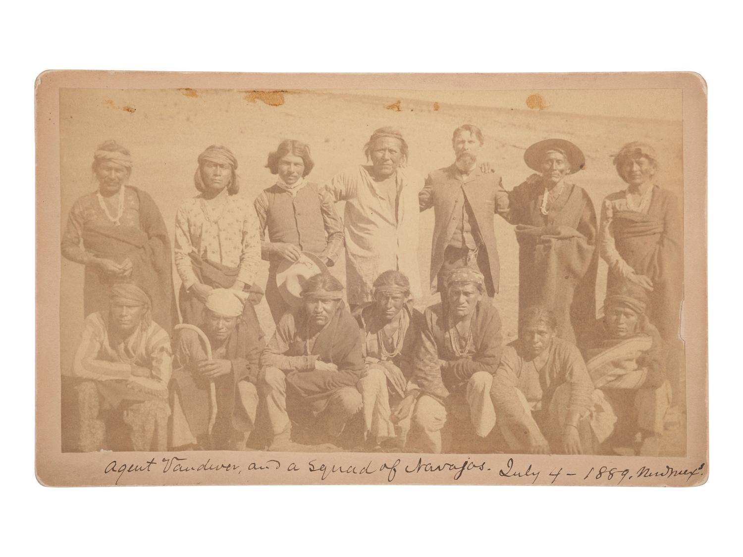 [NATIVE AMERICANS]. Boudoir photograph of "Agent Vandever and a squad of Navajos, July 4, 1889, New Mexico."