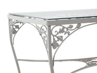 A Woodard "Orleans" Style Painted Iron Garden Table and Four Chairs