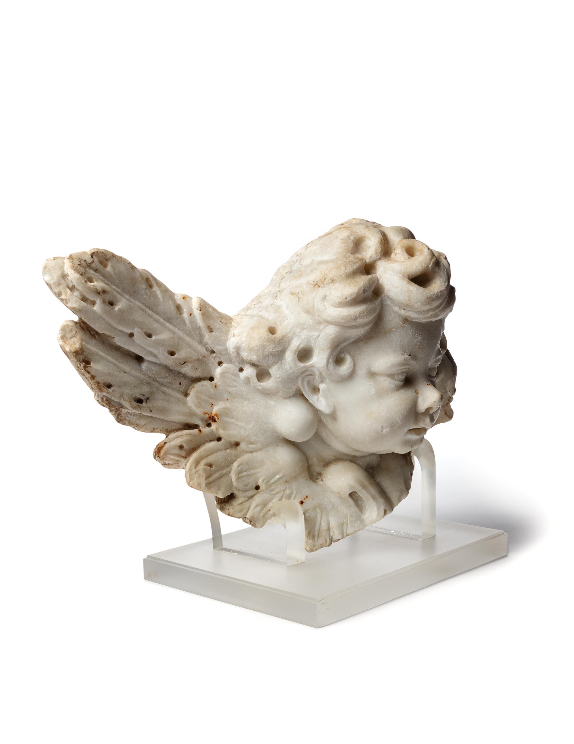 A Continental Marble Winged Cherub