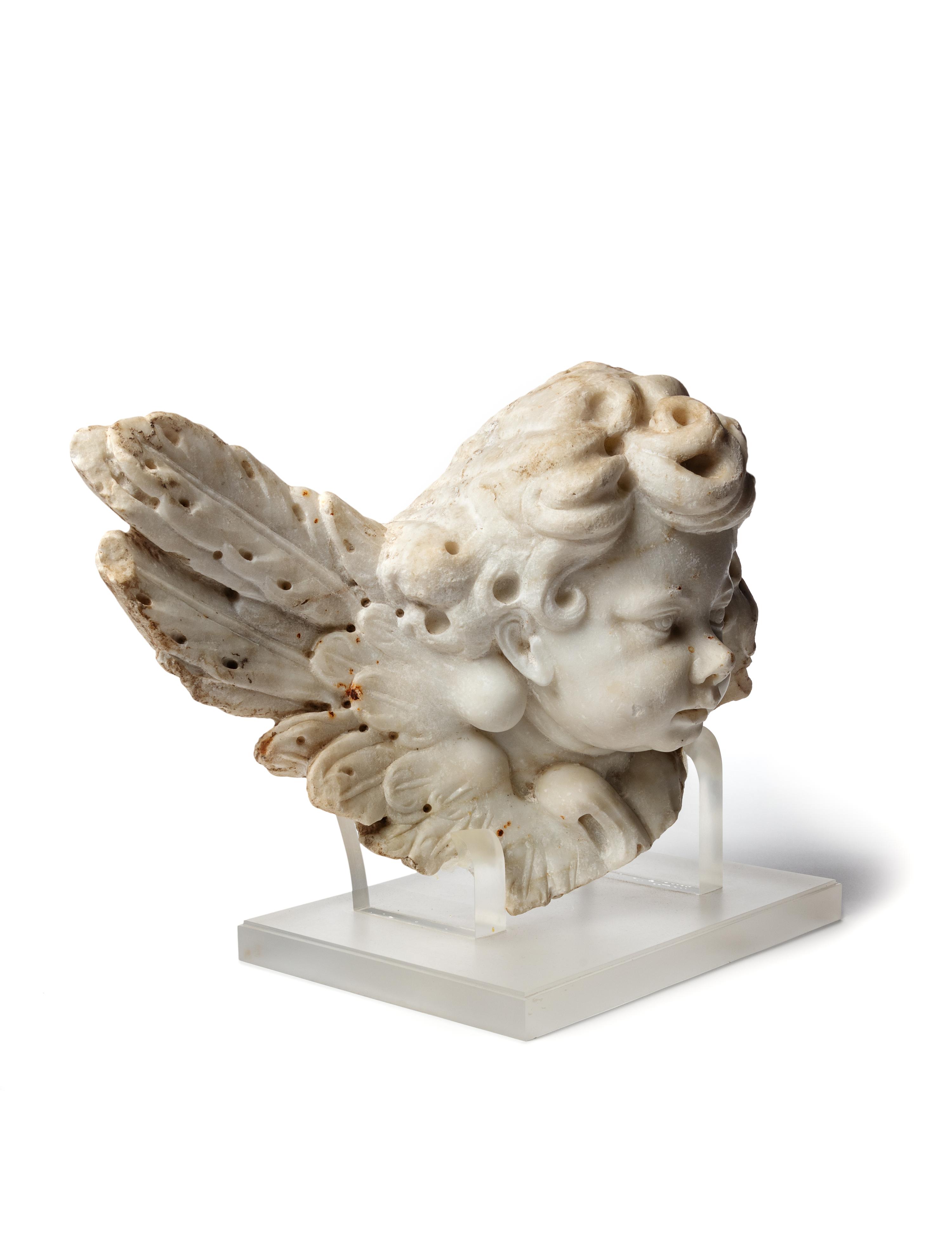 A Continental Marble Winged Cherub