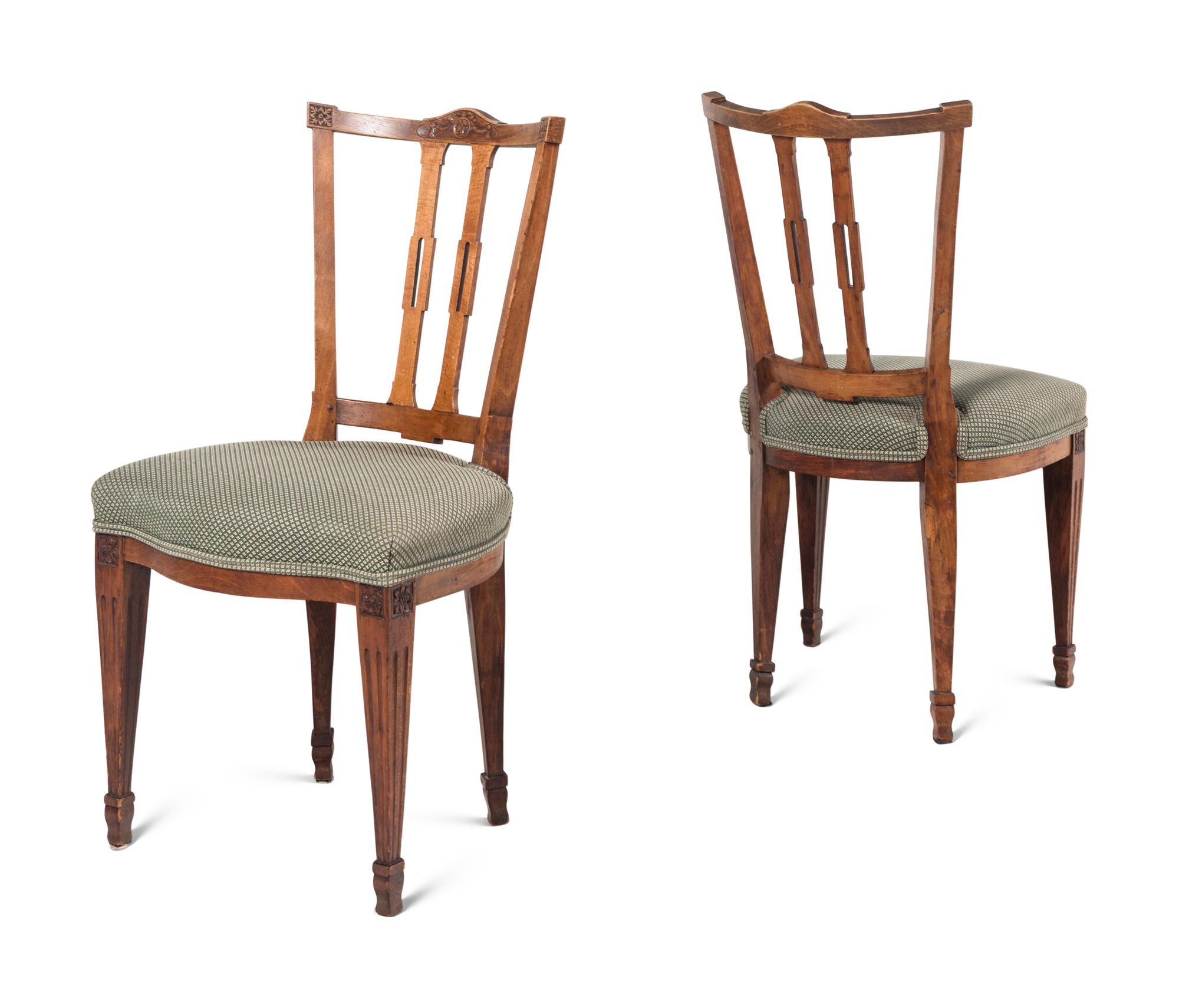 A Set of Four Dutch Fruitwood Dining Chairs