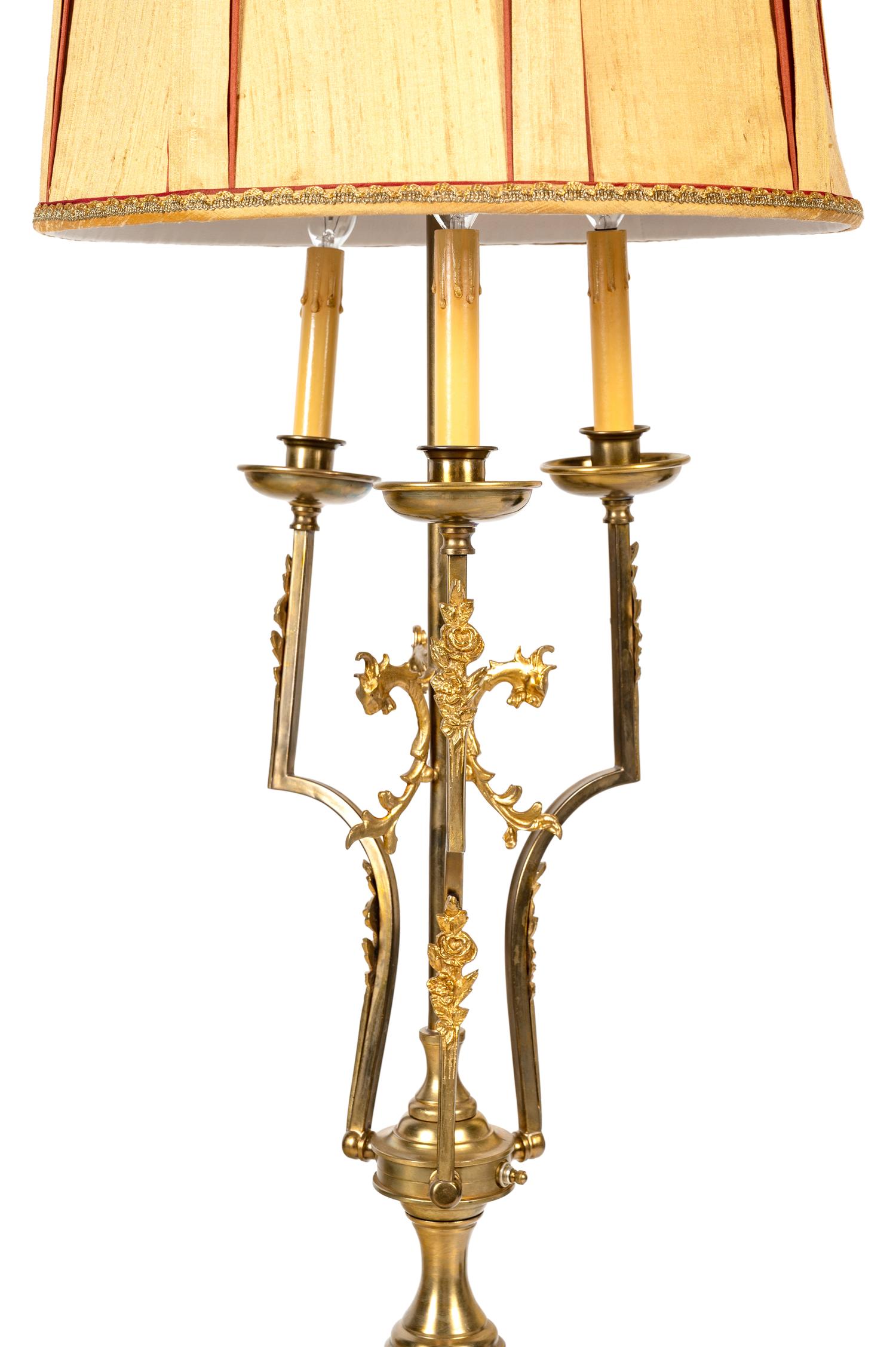An Empire Style Gilt and Patinated Metal Three-Light Floor Lamp