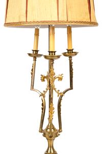 An Empire Style Gilt and Patinated Metal Three-Light Floor Lamp
