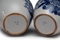 A Pair of Delft Lidded Tobacco Jars