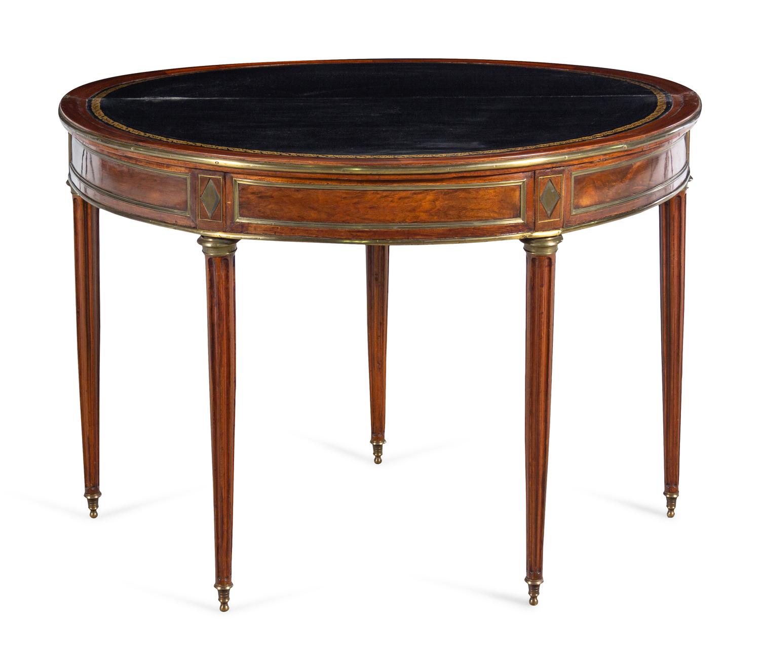 A Louis XVI Gilt Metal Mounted Mahogany Flip-Top Table