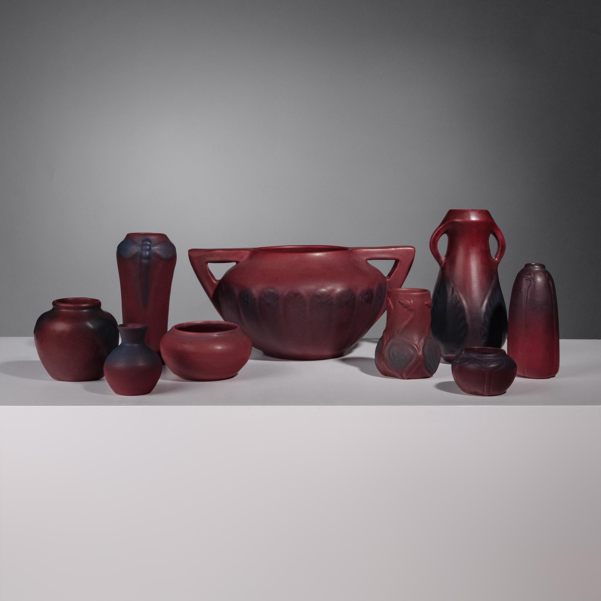 Group of Nine Mulberry Red Pottery Vases
