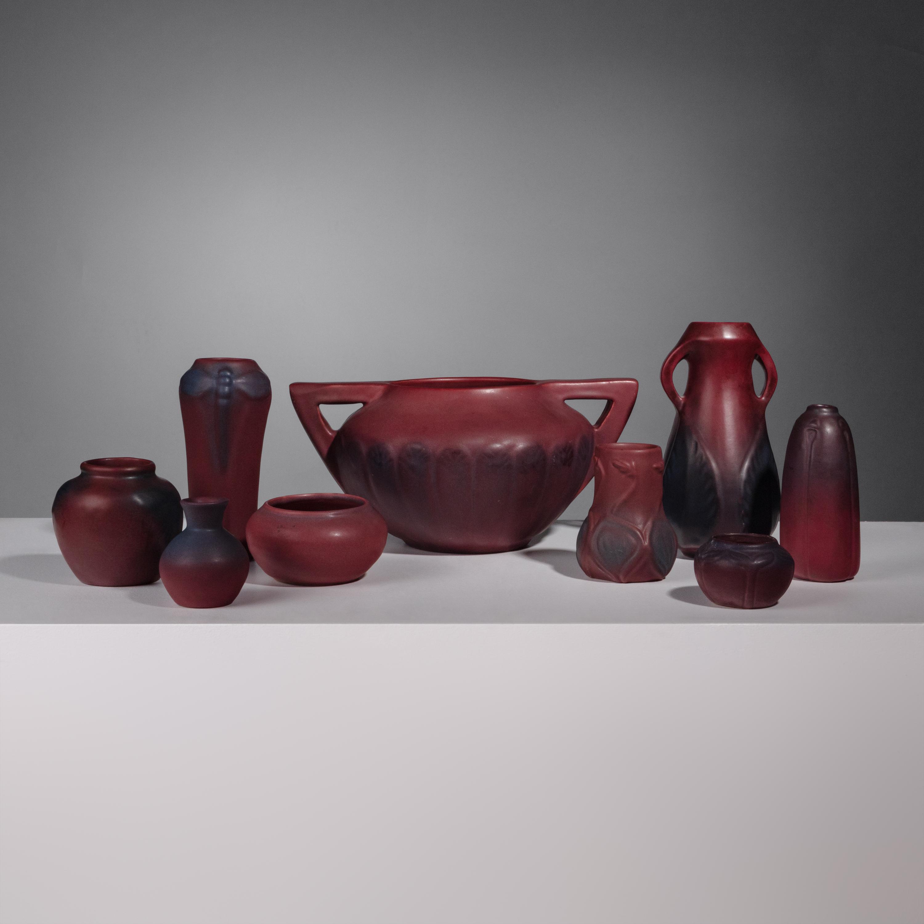 Group of Nine Mulberry Red Pottery Vases