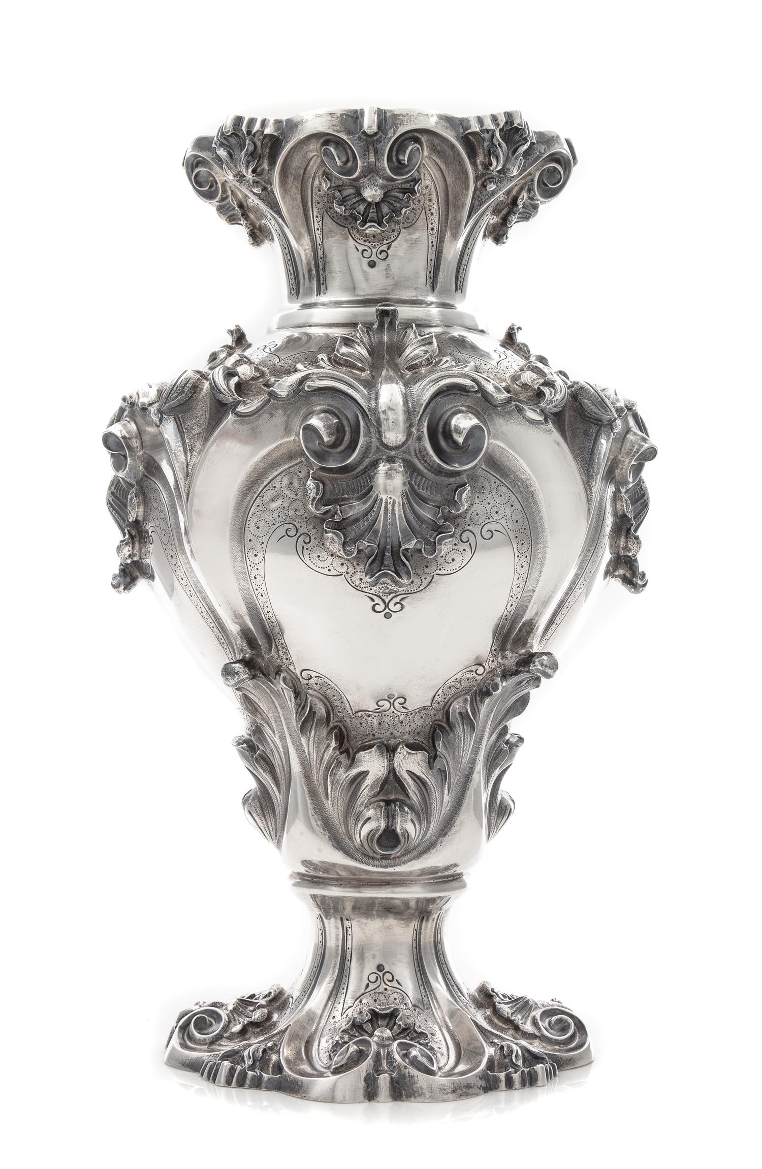 A Portuguese Silver Vase, Porto, First Half 20th Century, of baluster form with applied rocaille and foliate decoration.