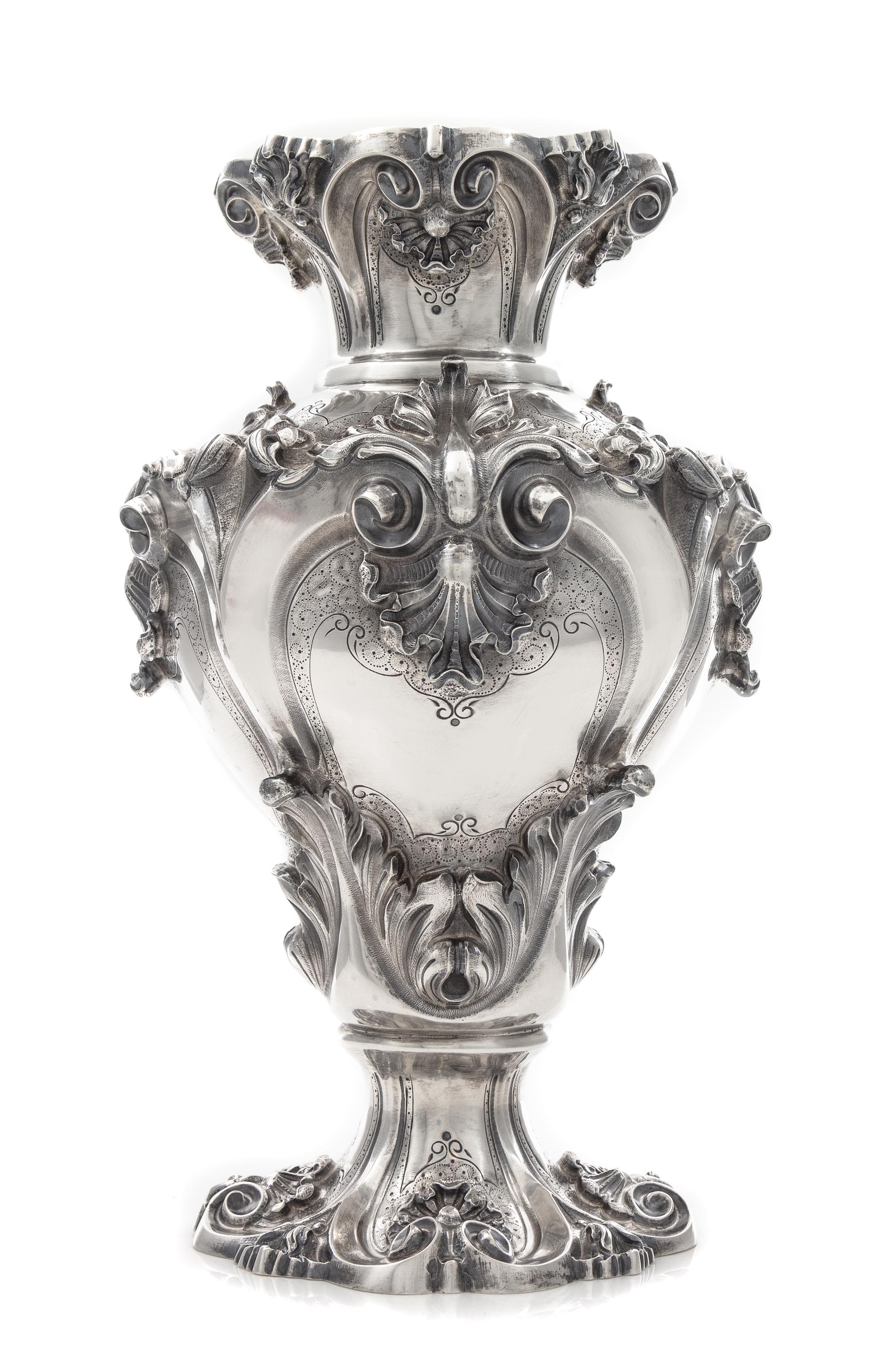 A Portuguese Silver Vase, Porto, First Half 20th Century, of baluster form with applied rocaille and foliate decoration.
