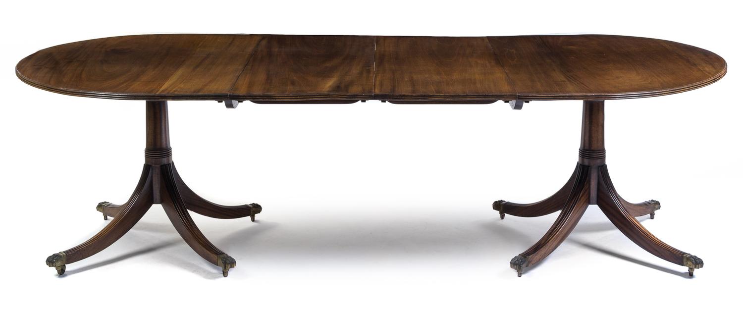 A George III Style Mahogany Double Pedestal Dining Table Height 27 3/4 x depth 44 x length 96 inches.