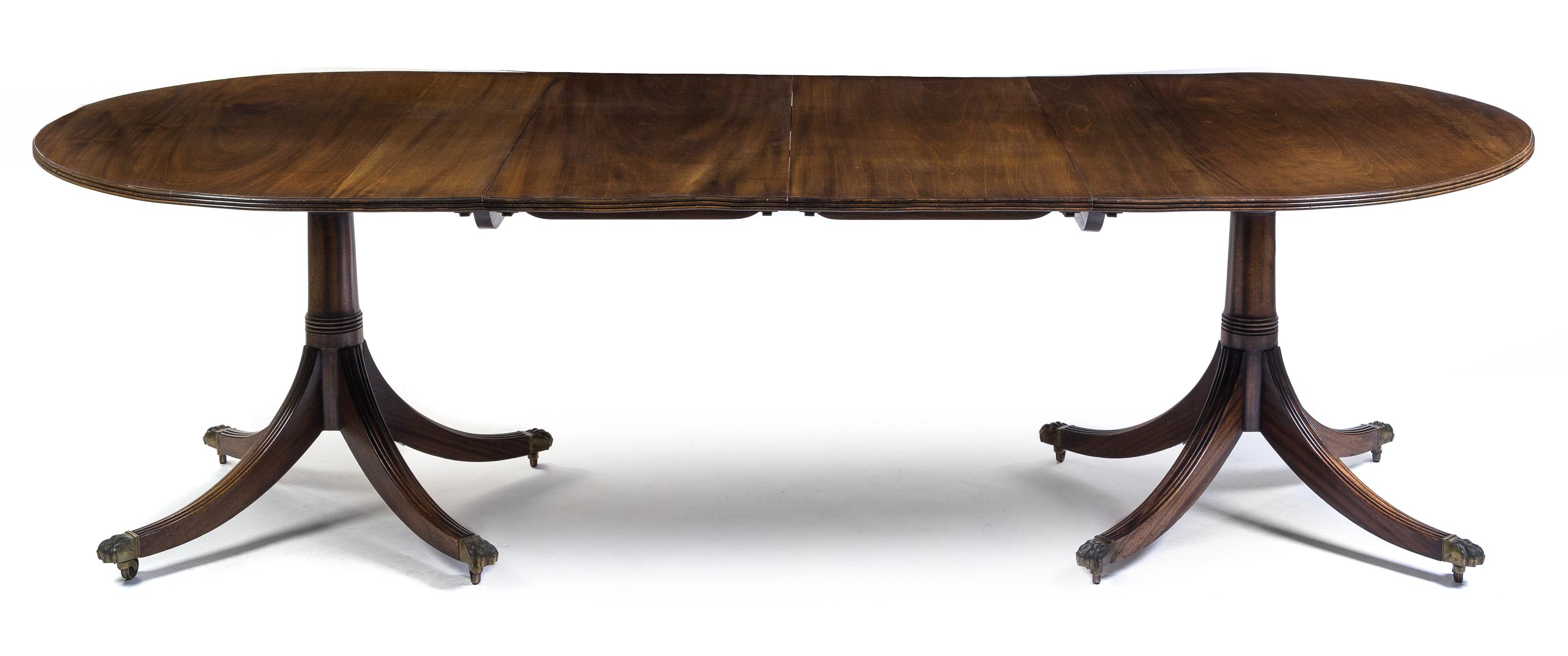 A George III Style Mahogany Double Pedestal Dining Table Height 27 3/4 x depth 44 x length 96 inches.