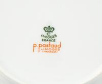 A Set of Eight Limoges Porcelain Soup Plates