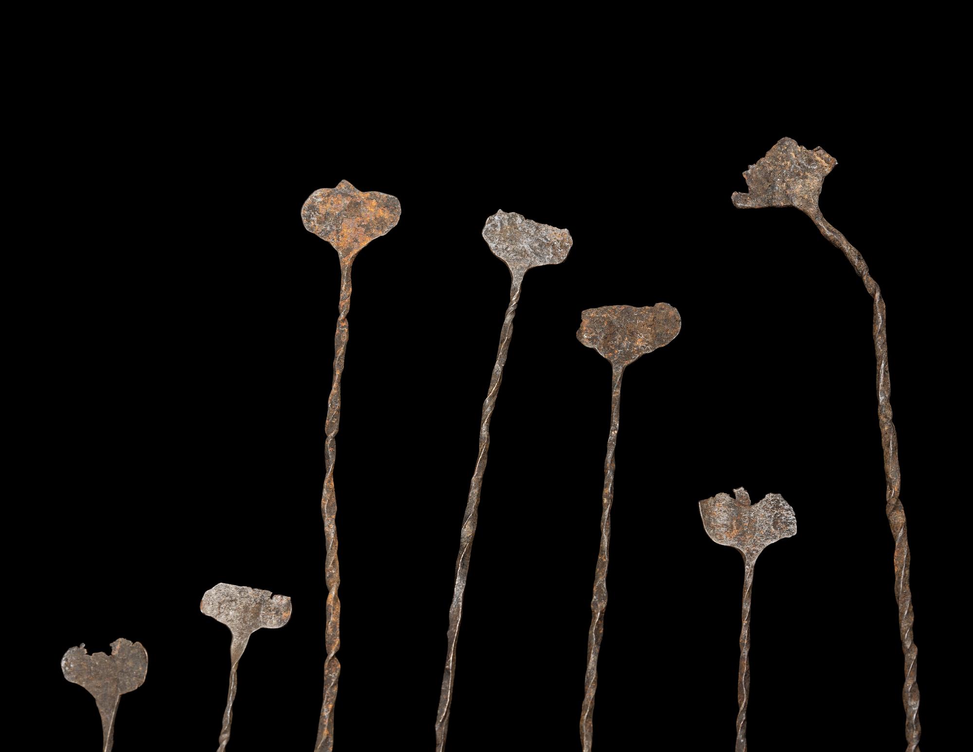 A Group of Kissi Iron Pennies (Currency)