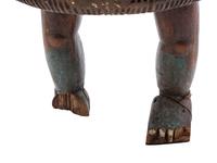 An Ashanti Carved and Gouged Painted Wood Breasted Drum