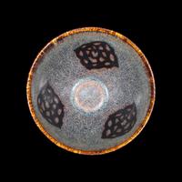 A Chinese Jizhou 'Papercut' Teabowl, Possibly Southern Song Dynasty 或為南宋 吉州窯貼花盞