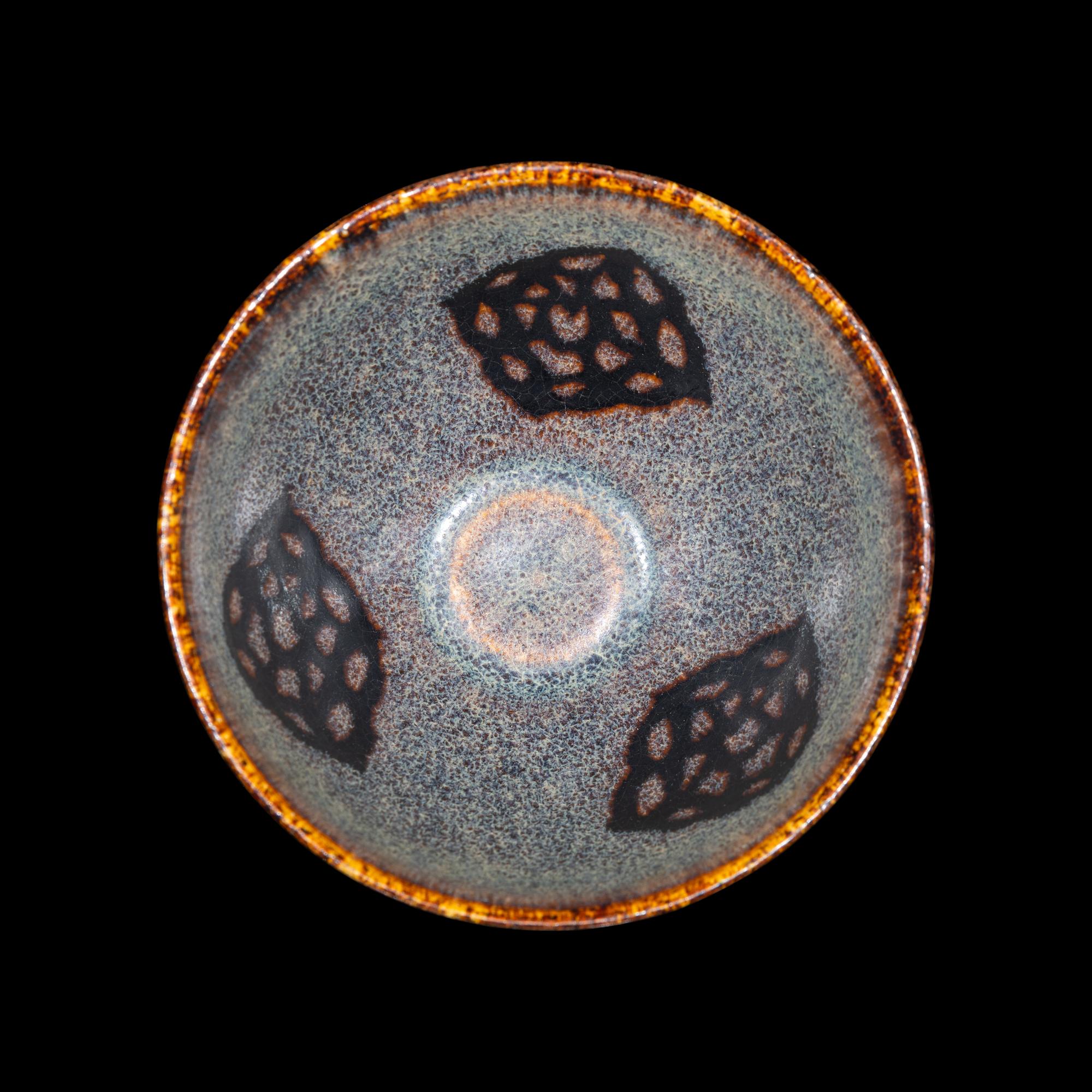 A Chinese Jizhou 'Papercut' Teabowl, Possibly Southern Song Dynasty 或為南宋 吉州窯貼花盞