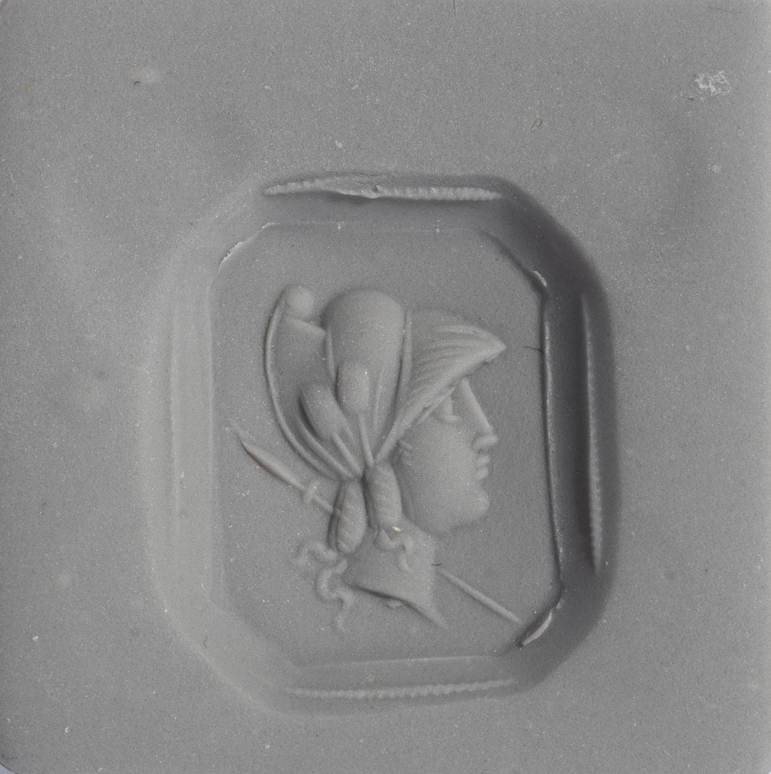 A Neoclassical Gold and Carnelian Finger Ring with the Bust of a Deity