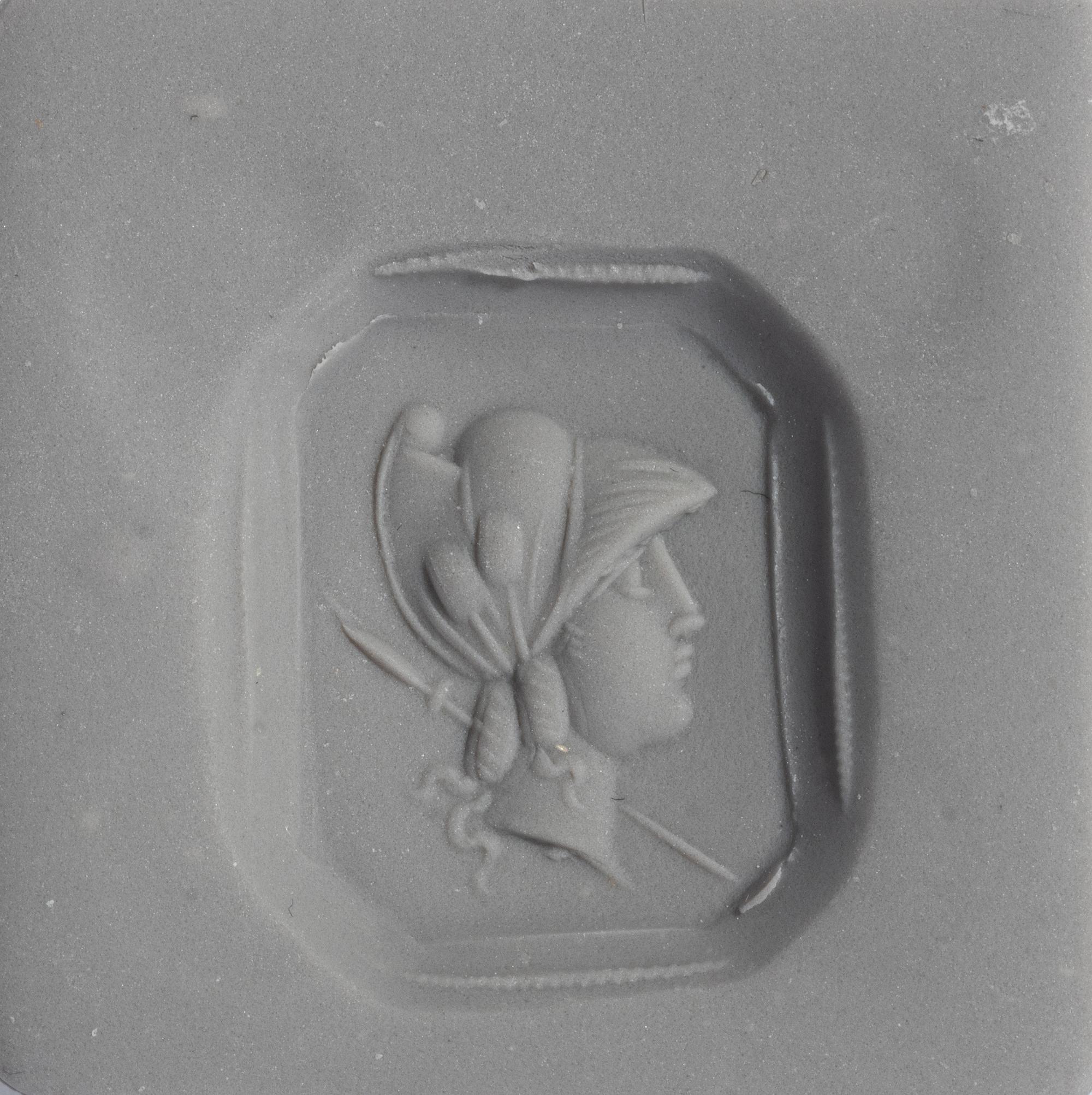 A Neoclassical Gold and Carnelian Finger Ring with the Bust of a Deity
