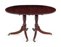 A Regency Style Mahogany Double Pedestal Extension Dining Table — 20TH CENTURY