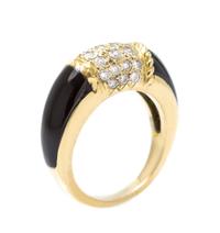 An 18 Karat Yellow Gold, Onyx, and Diamond Ring 4.20 dwts.