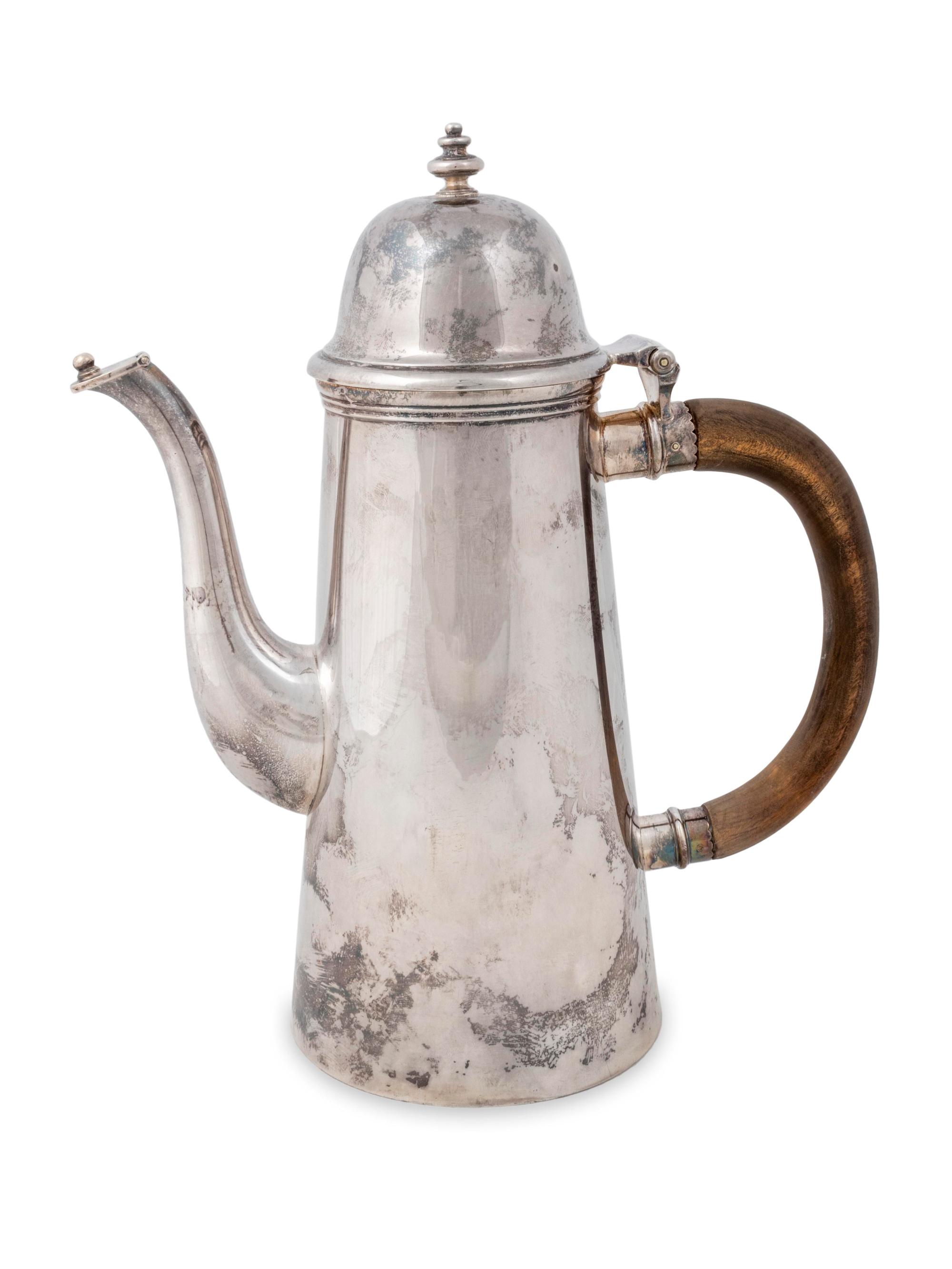 An English Silver Lighthouse Coffee Pot — Maker's mark P&B, London, 1962, For James Robinson, Inc., New York