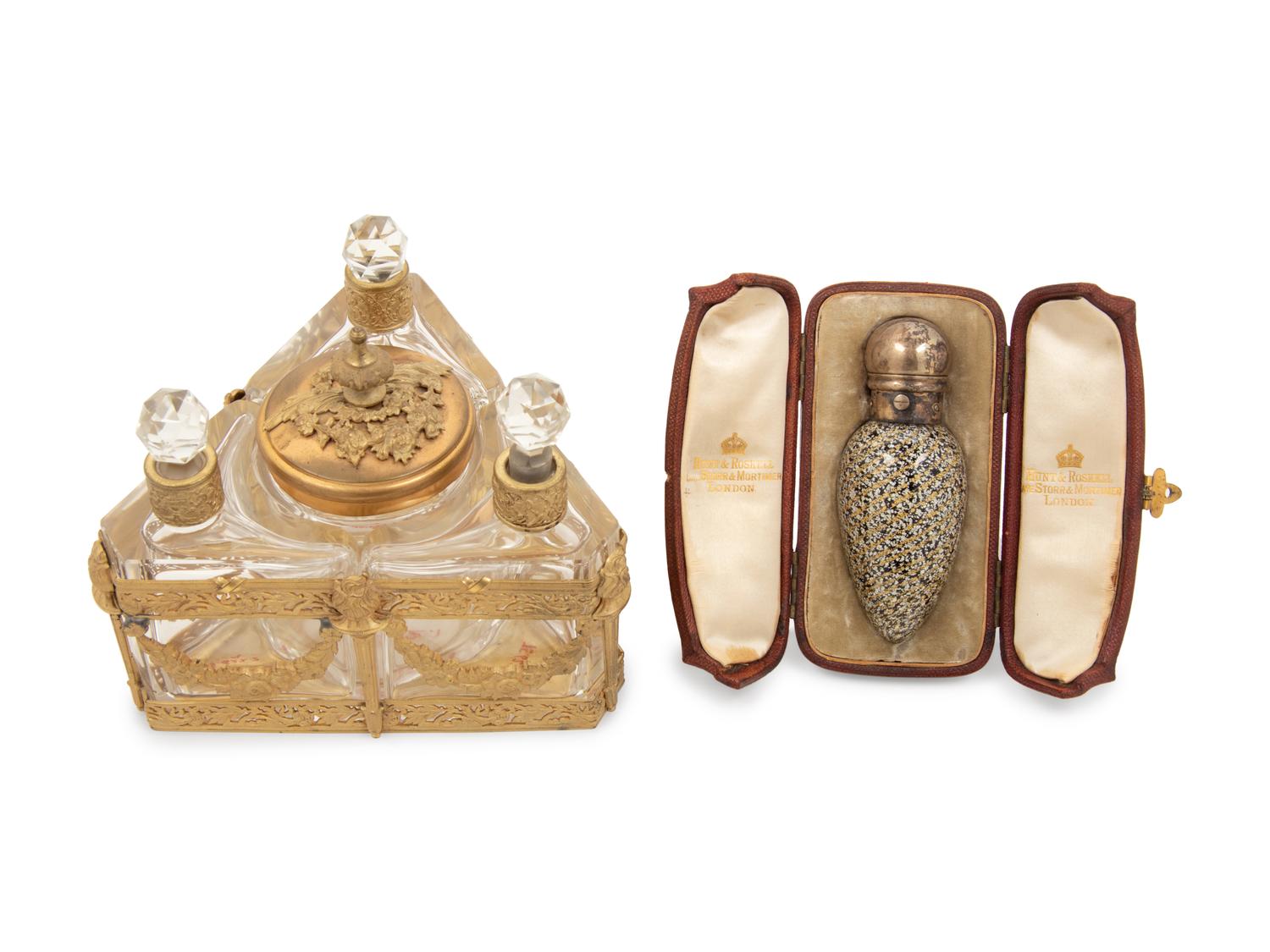 A Group of Metal-Mounted Glass Scent Bottles