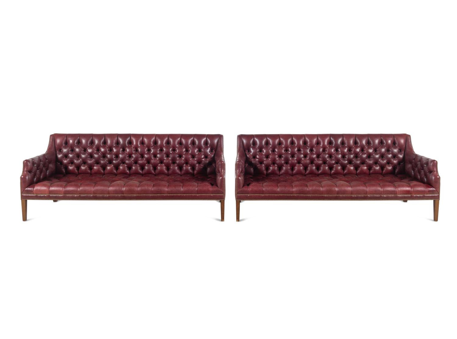 A Pair of English Button-Tufted Leather Sofas
