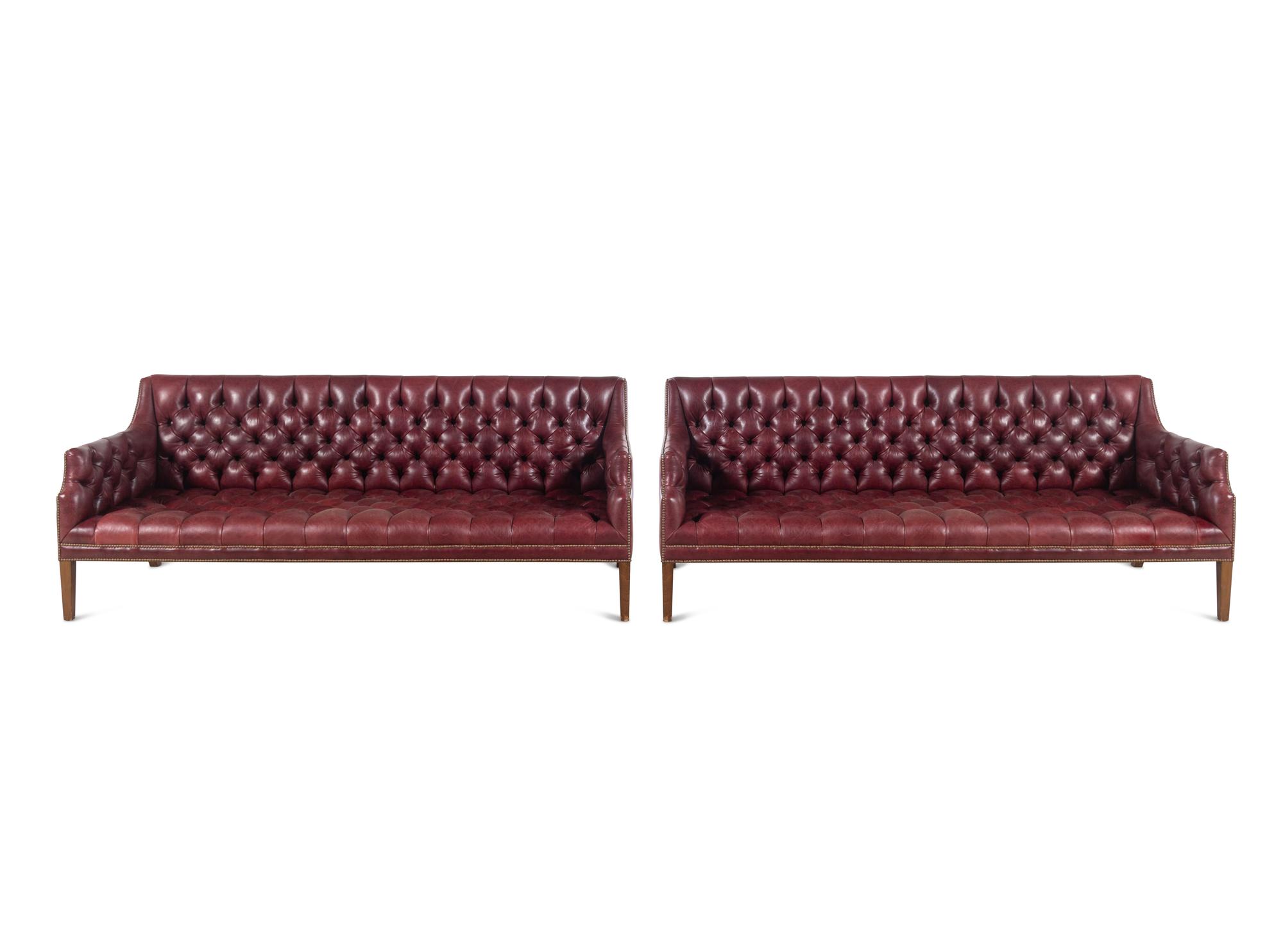 A Pair of English Button-Tufted Leather Sofas