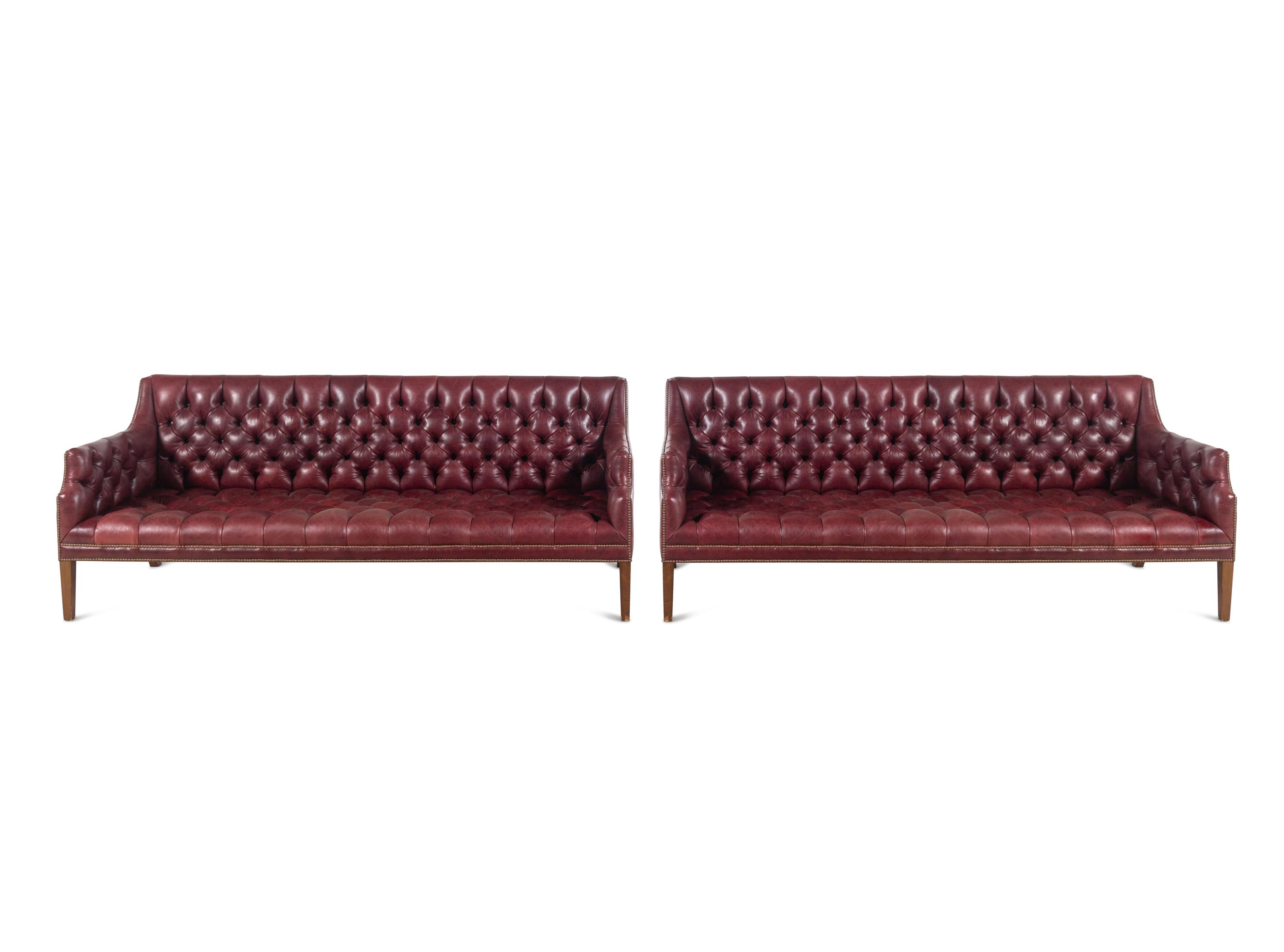 A Pair of English Button-Tufted Leather Sofas