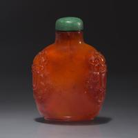 A Chinese Carved Amber Snuff Bottle, Qing Dynasty, Late 18th Century — 清中期 琥珀鋪首啣環耳鼻煙壺