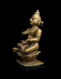 An Indian Orissa Bronze Figure of Seated Vishnu