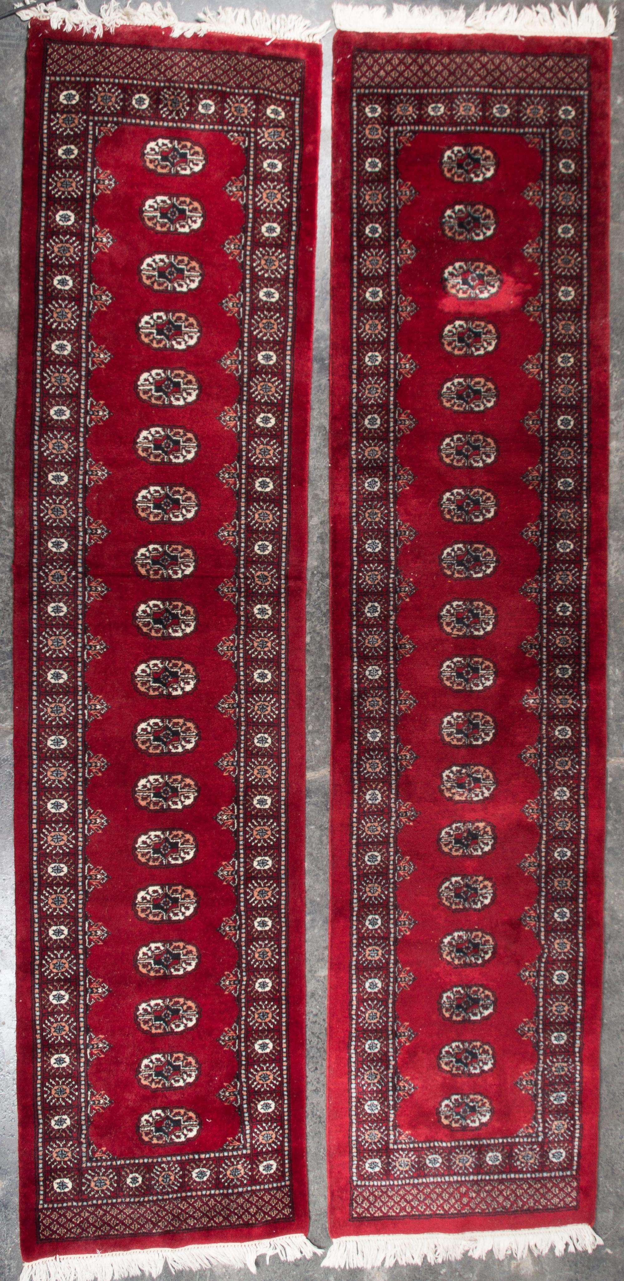 Two Bokhara Wool Runners Length of first 10 feet 5 inches.