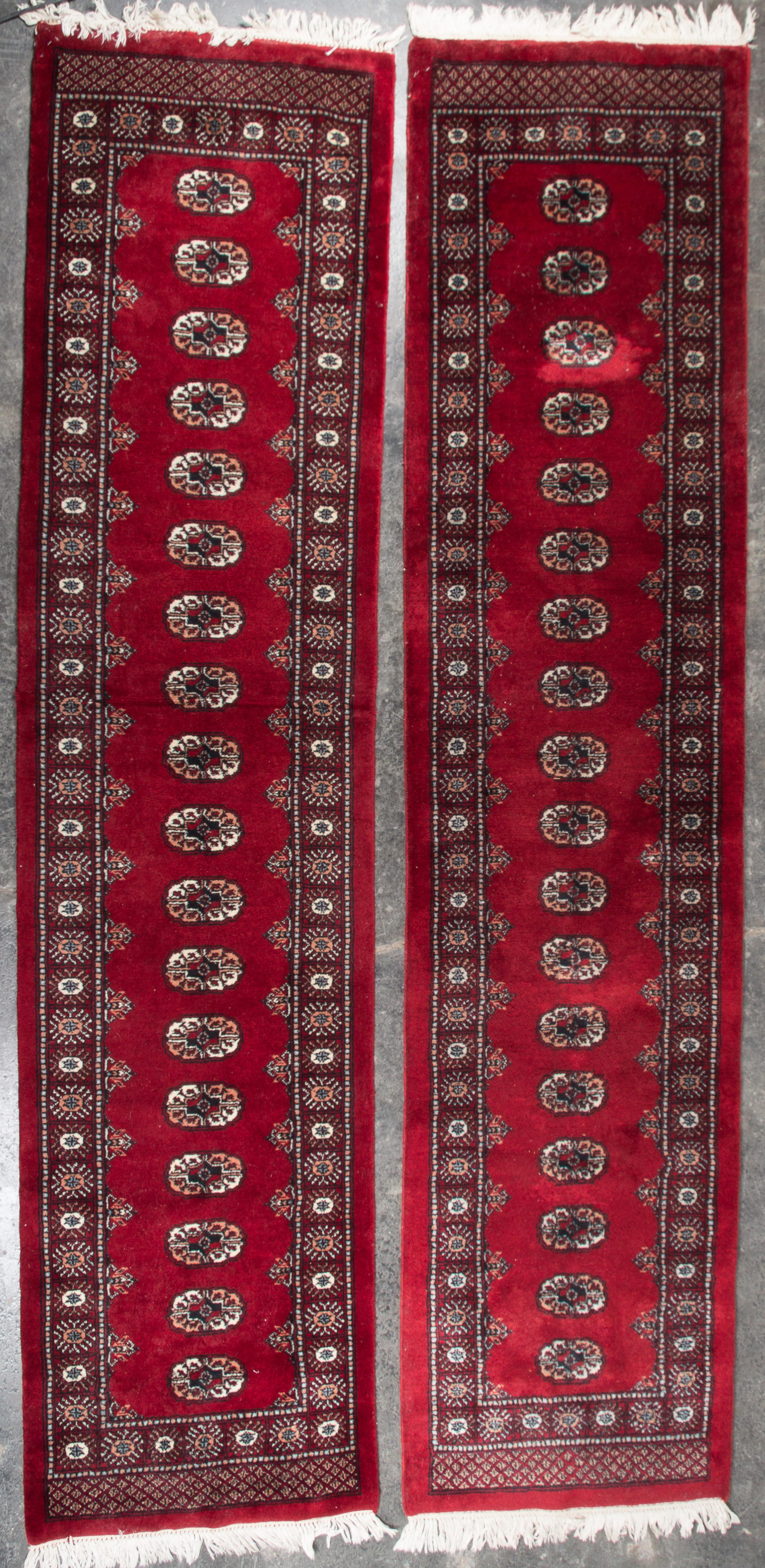 Two Bokhara Wool Runners Length of first 10 feet 5 inches.