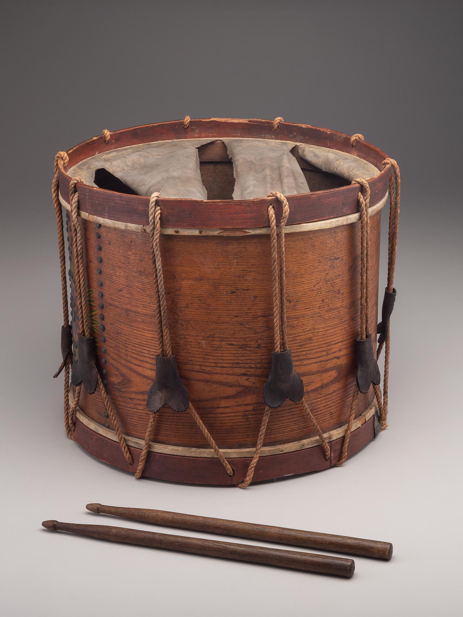 [MILITARIA]. Possibly Mexican War painted drum featuring ornate tack design, with drumsticks.