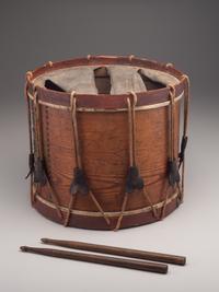 [MILITARIA]. Possibly Mexican War painted drum featuring ornate tack design, with drumsticks.