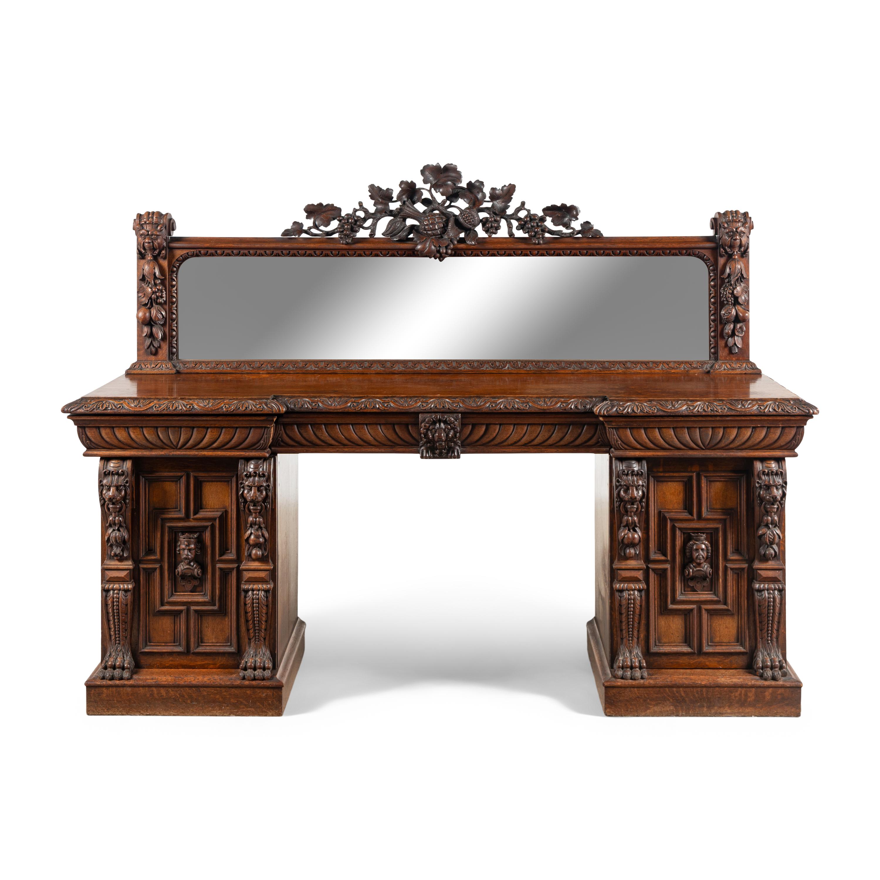 An English Renaissance Revival Carved Oak Serving Table