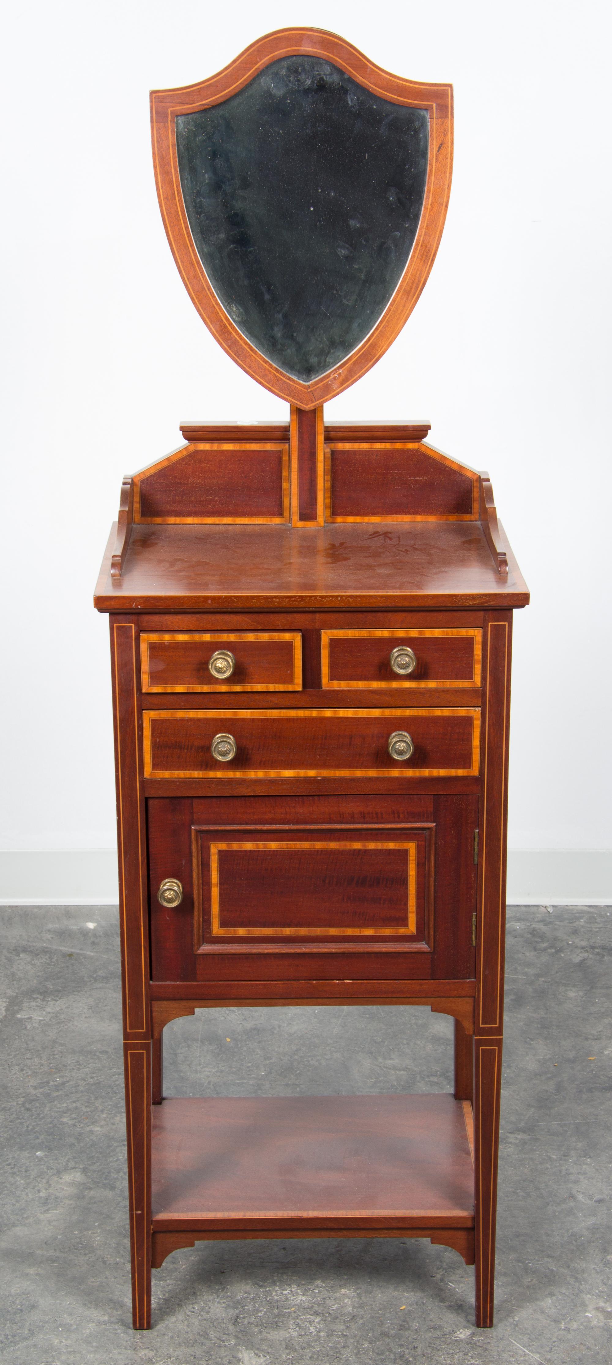 A Sheraton Style Mahogany Dressing Table Height 59 x width 18 1/2 x depth 13 1/4 inches. — 20TH CENTURY