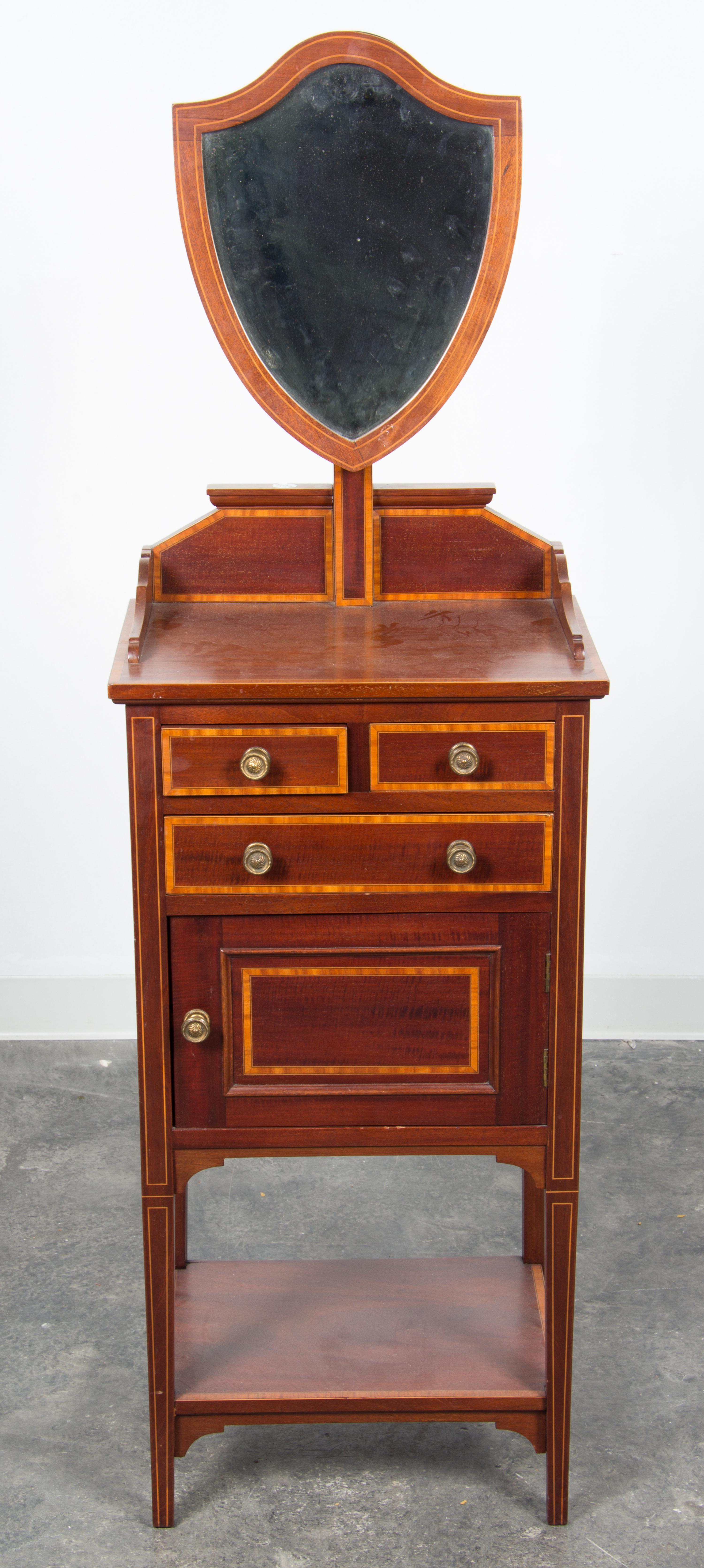 A Sheraton Style Mahogany Dressing Table Height 59 x width 18 1/2 x depth 13 1/4 inches. — 20TH CENTURY