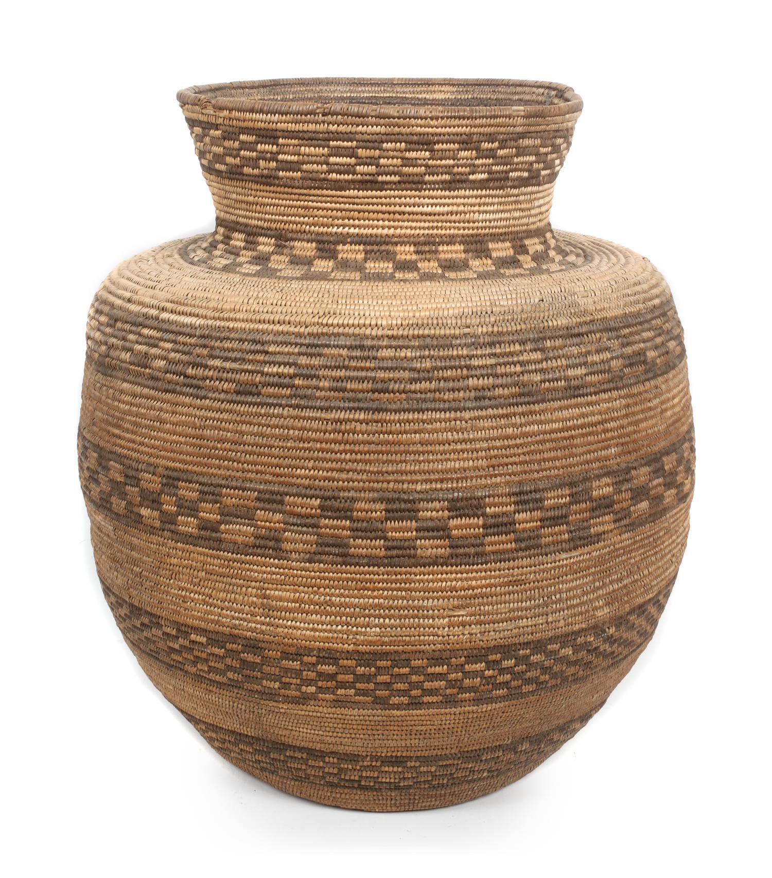 A Pima Fiber Basket Height 28 x diameter 14 inches.