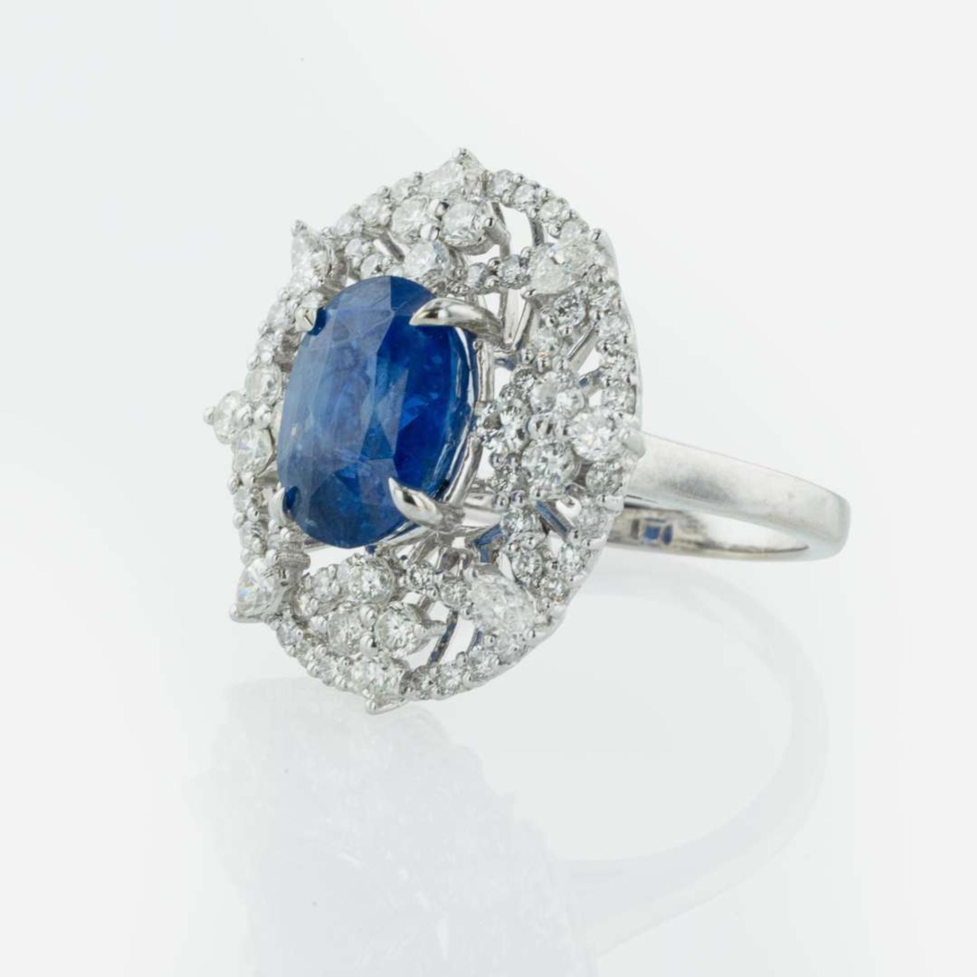 A 14K White Gold, Sapphire, and Diamond Ring