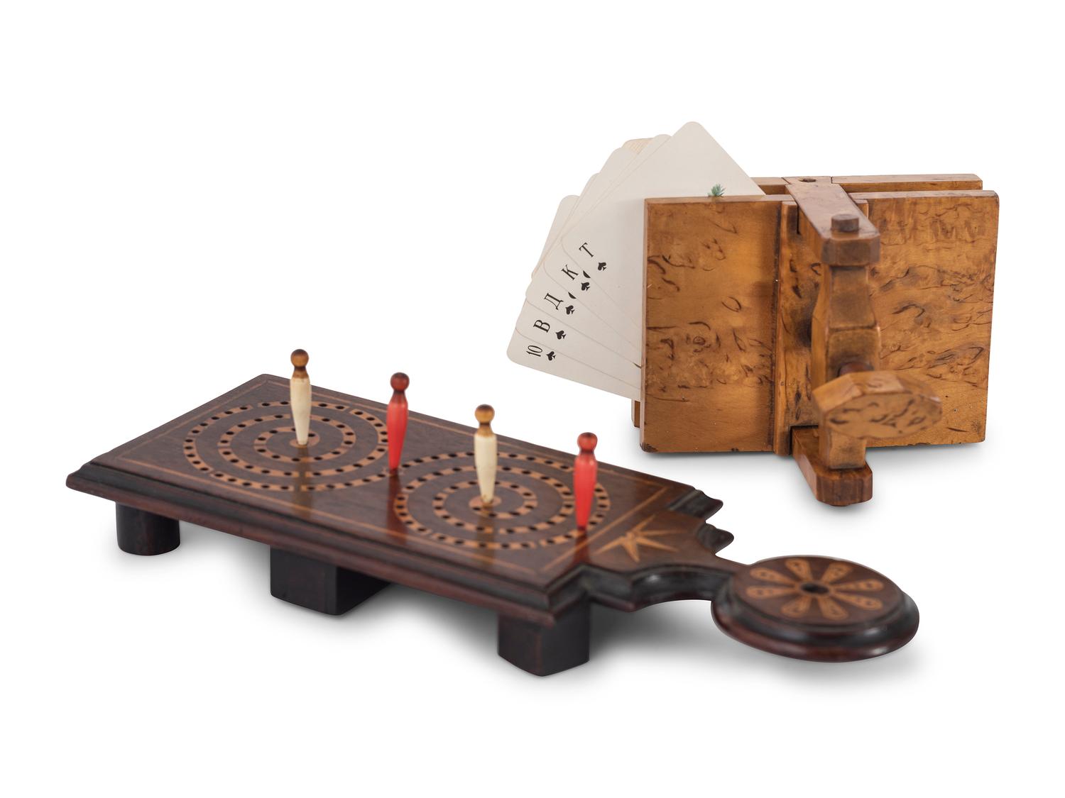 Two Carved Wood Game Elements