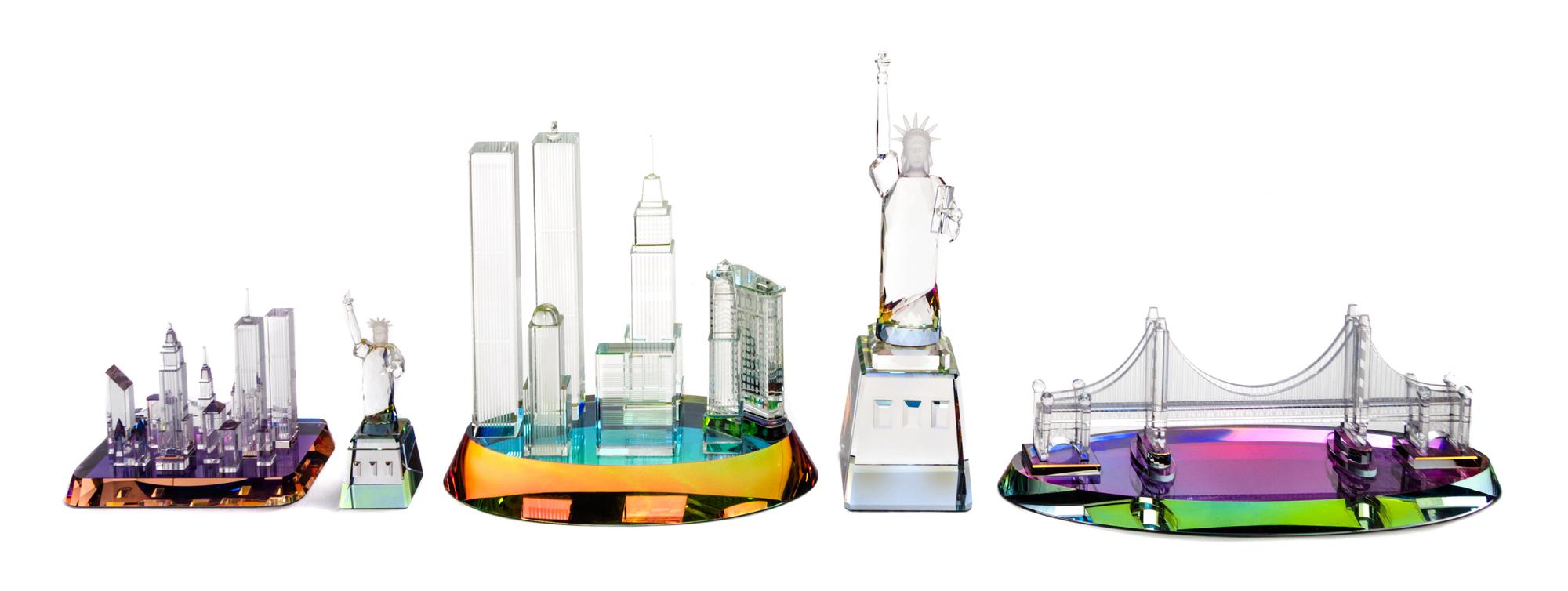 A Group of Five Crystal World Models Height of tallest 10 7/8 inches.