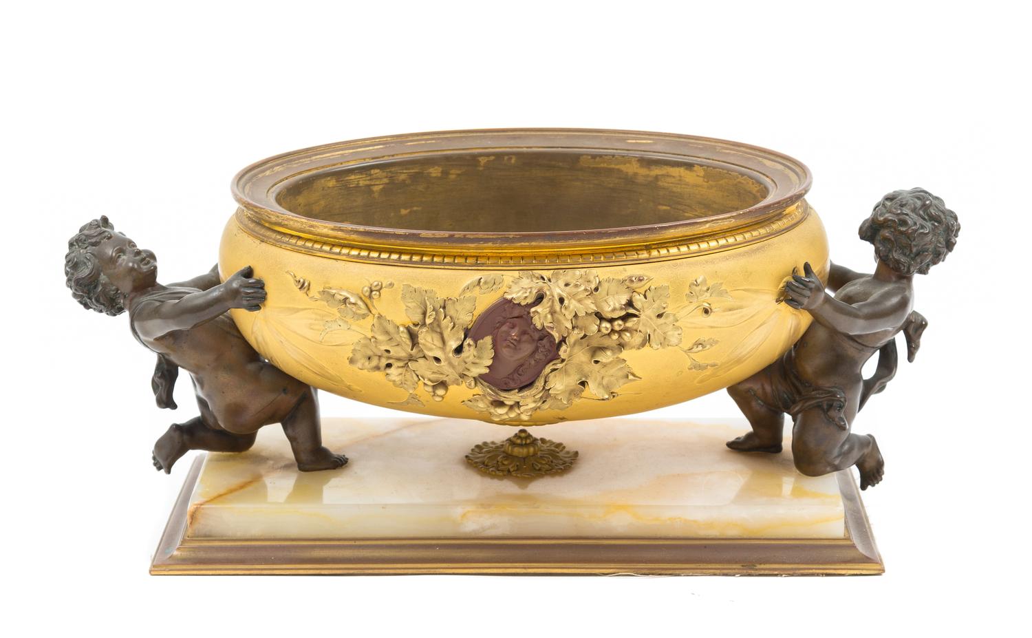 A Continental Gilt and Patinated Bronze and Onyx Jardiniere Height 5 7/8 x width 14 1/2 inches. — LATE 19TH CENTURY