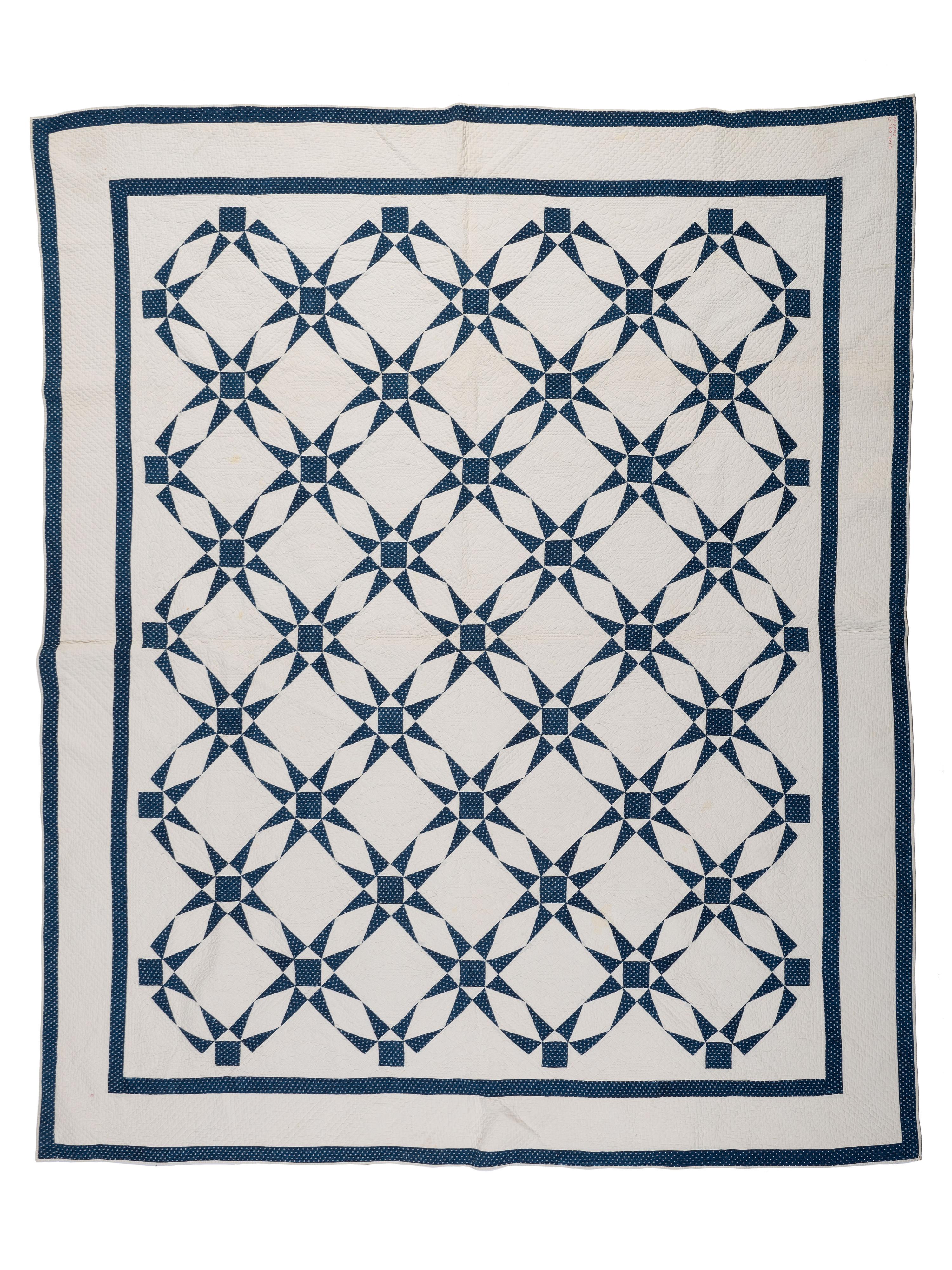 Two Blue and White Pieced Quilts