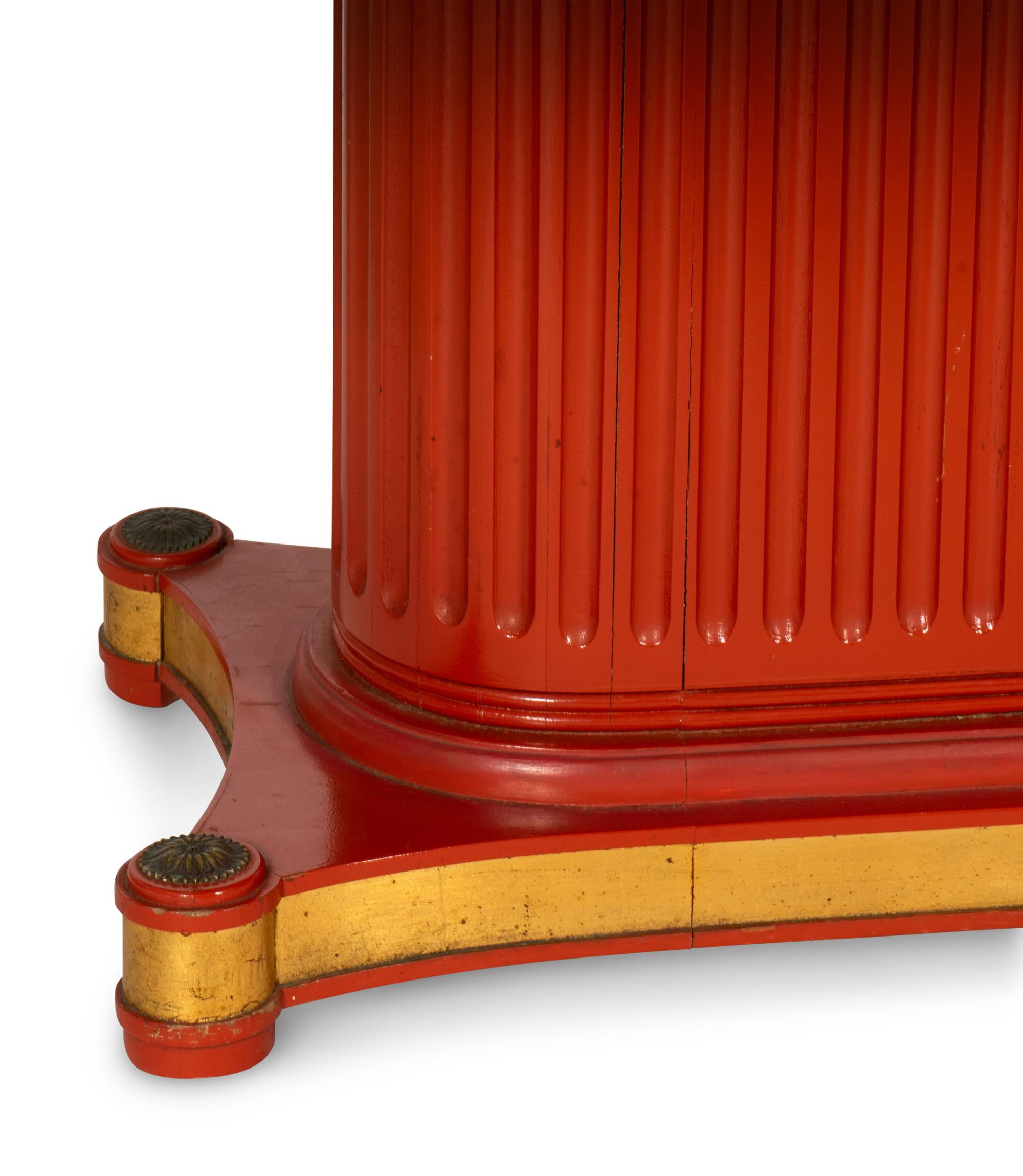 An Art Deco Style Parcel Gilt Blaze-Orange Painted Pedestal Table