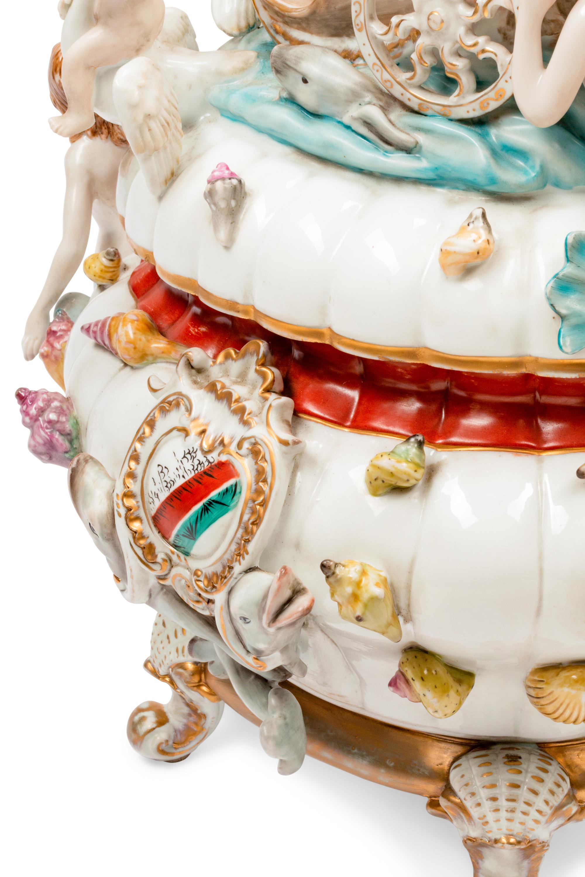 A Pair of German Porcelain Figural Tureens and Covers